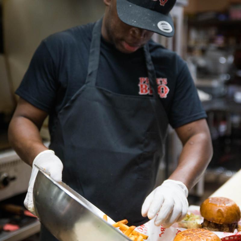 A member of the staff preparing food